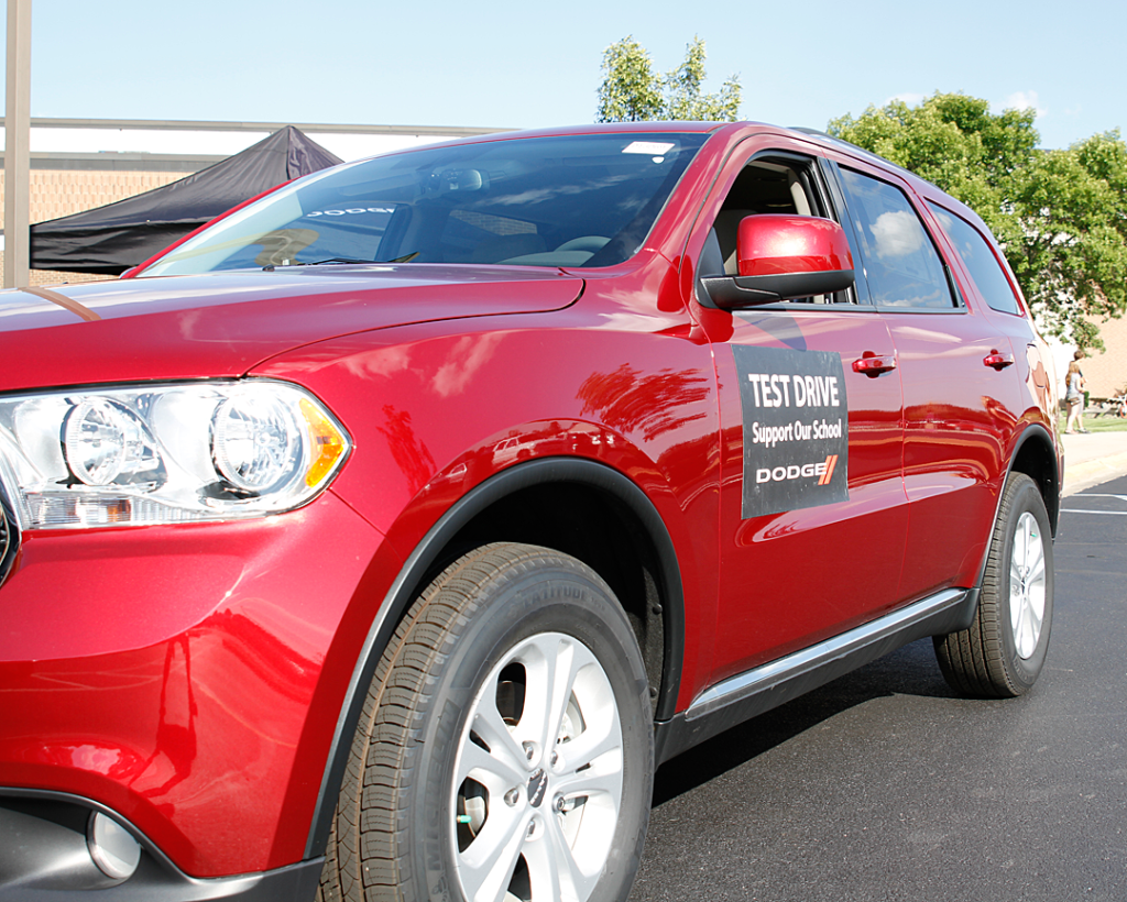 One of the Ewald Dodge vehicles available for test driving during last year's OSBC fundraiser at the high school. 